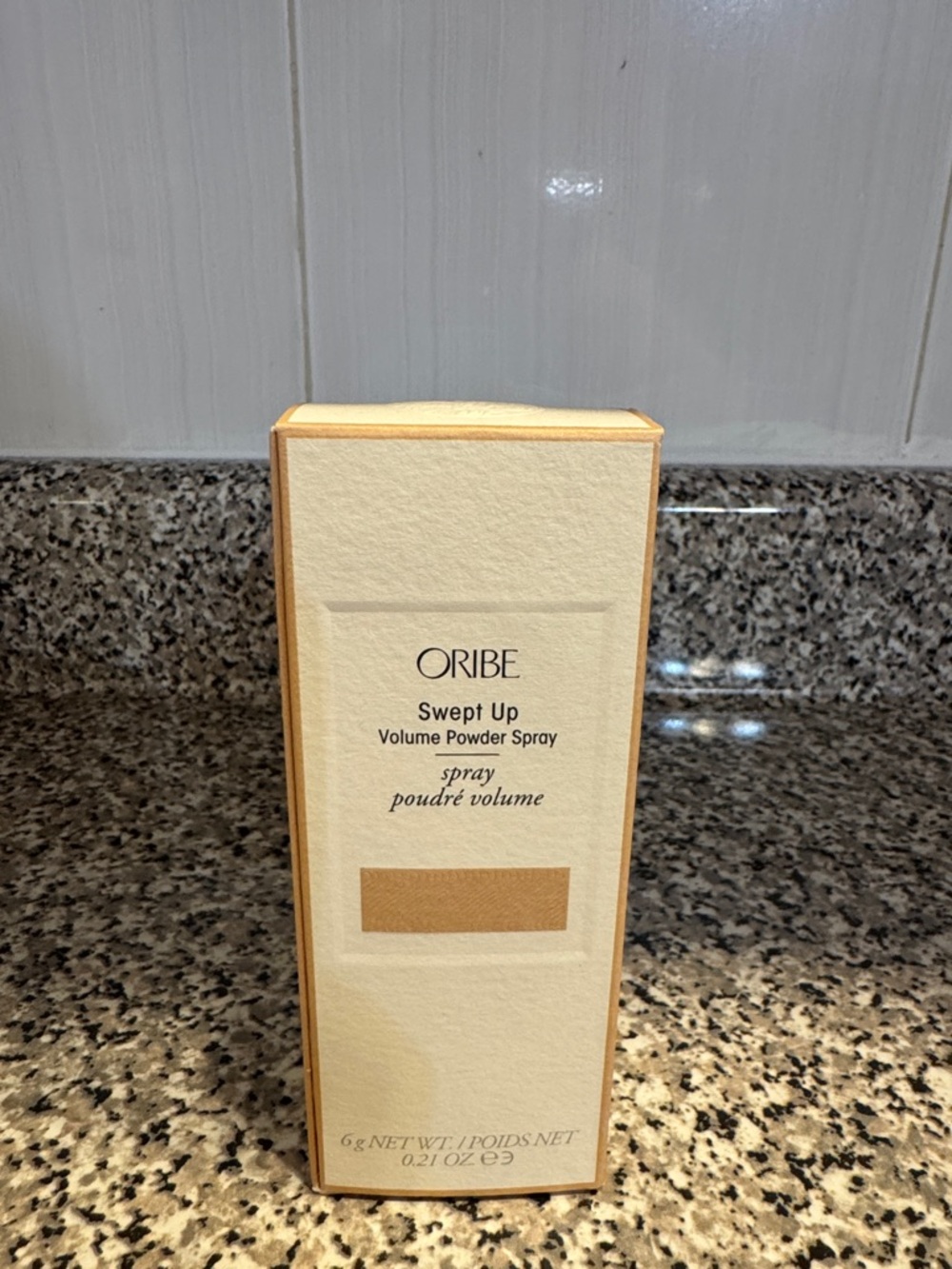 Oribe Swept Up Volume Powder Spray – Cream & Gold Box